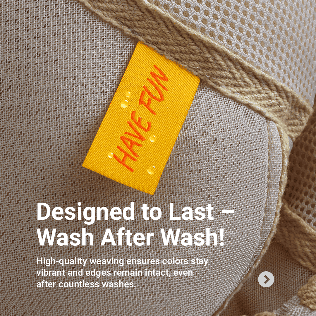 Yellow Have Fun woven tag beneath a beige fabric strap, with water droplets and a Designed to Last washing message.