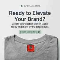 Gray T-shirt with a red neck label beneath Ready to Elevate Your Brand and Design Yours Now promotional text.